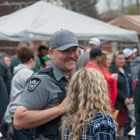 Police officer engaging with community